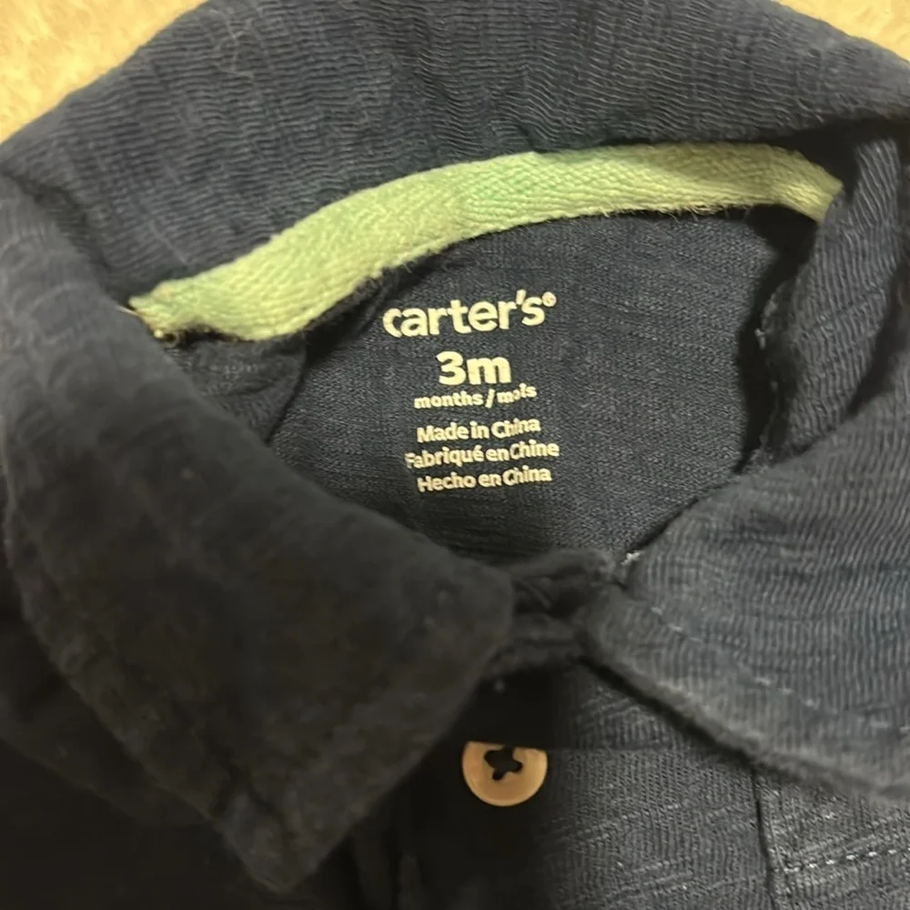 Carters navy blue polo shirt with 3 buttons. 3 months. Short sleeve